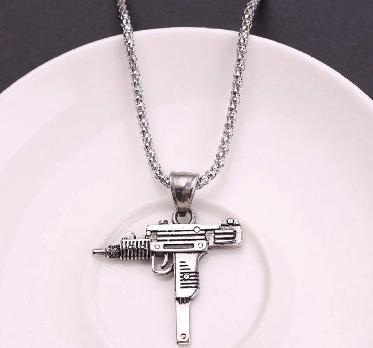 Diamond Encrusted Uzi Pendant – Bold & Luxurious Statement Piece