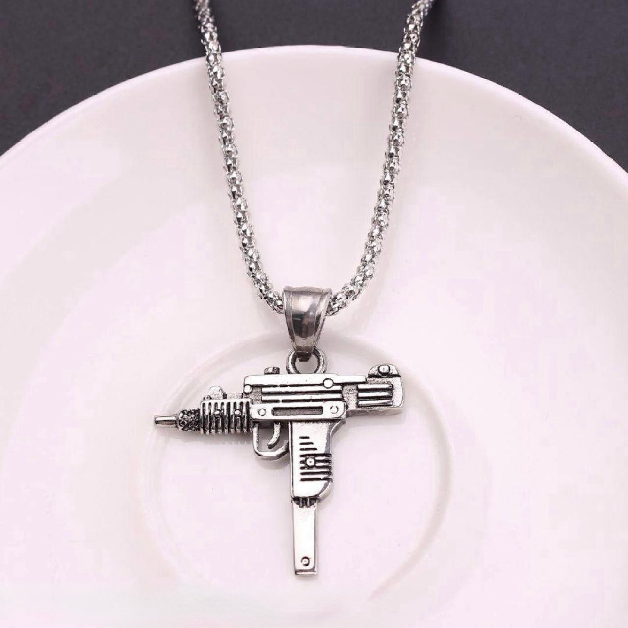 Diamond Encrusted Uzi Pendant – Bold & Luxurious Statement Piece